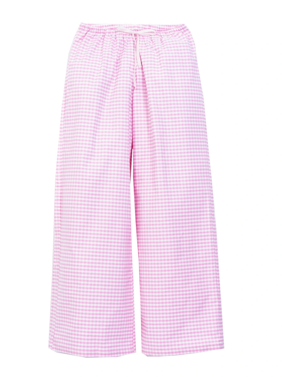 Flat lay of pink gingham petite pyjama bottoms with short inseam